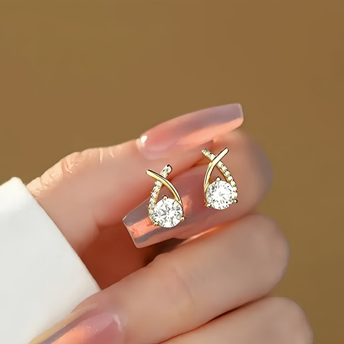 Boucles d'Oreilles avec Croix Dorée et Zircone