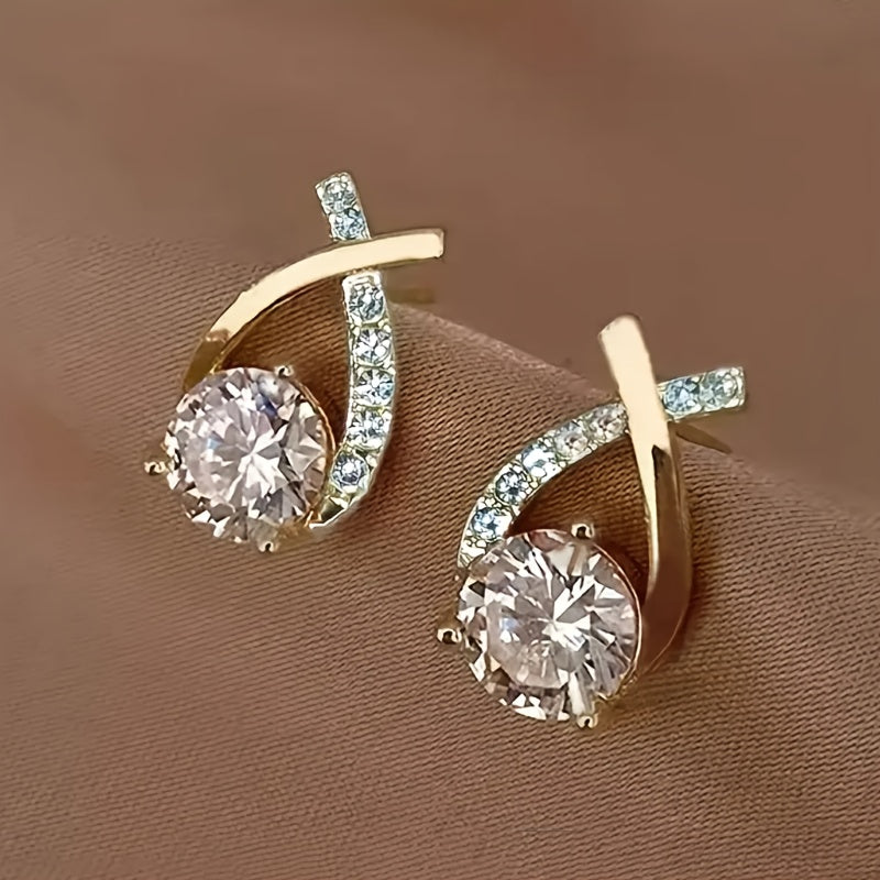 Boucles d'Oreilles avec Croix Dorée et Zircone